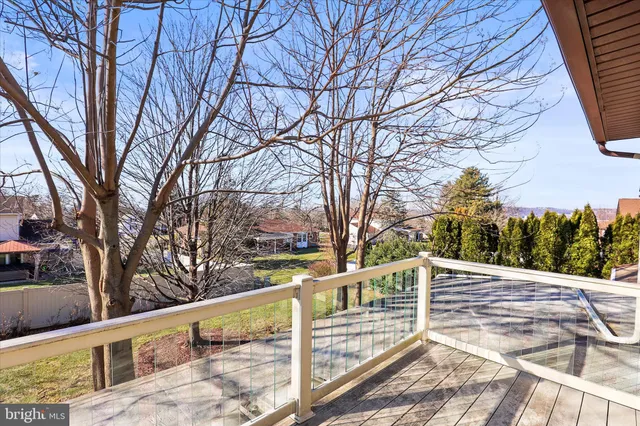 a bedroom with a bed and a lamp