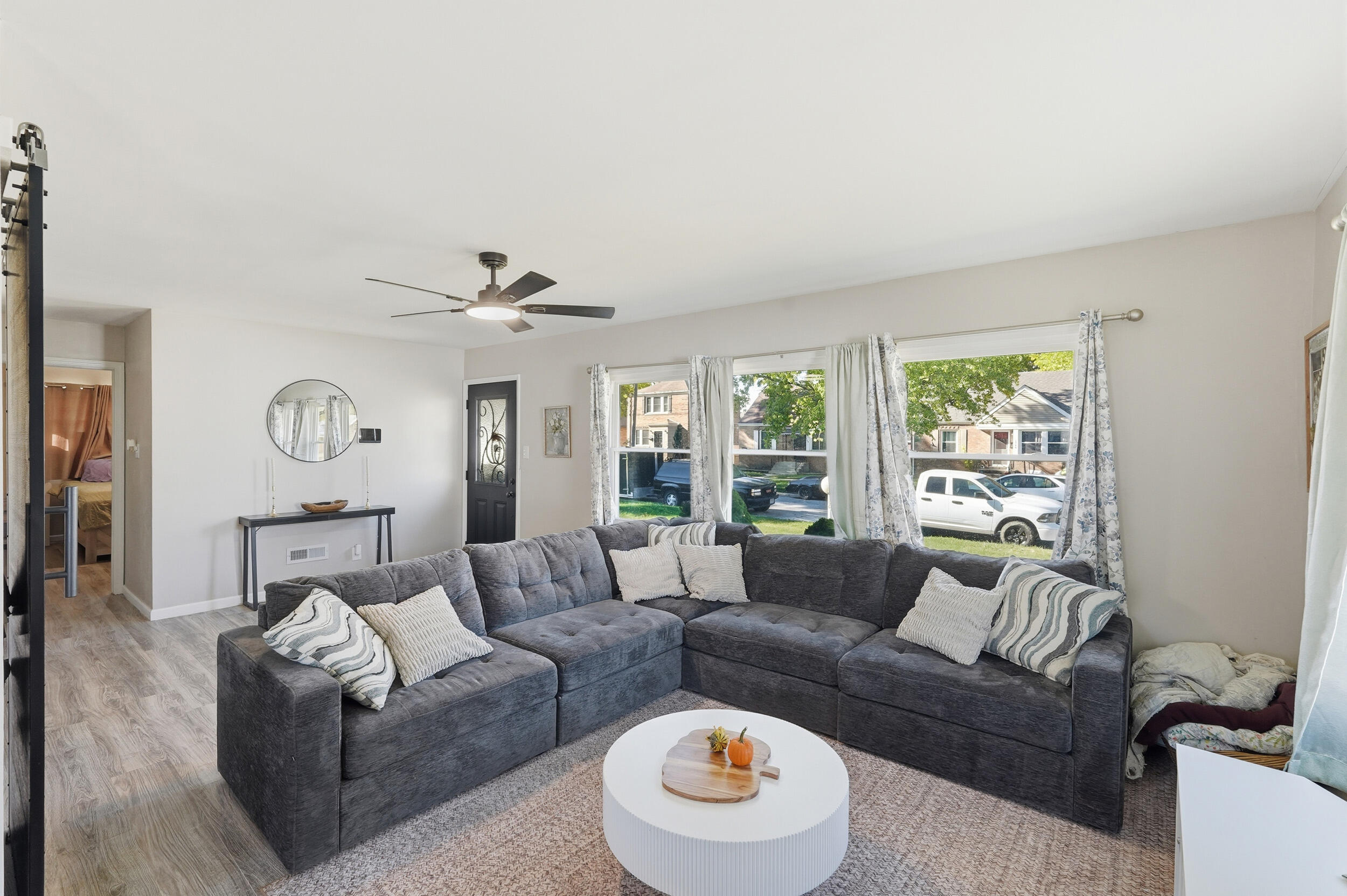 3737 Fillmore Street Gary, IN 46408 - Photo 5 of 19 a living room with furniture and a large window