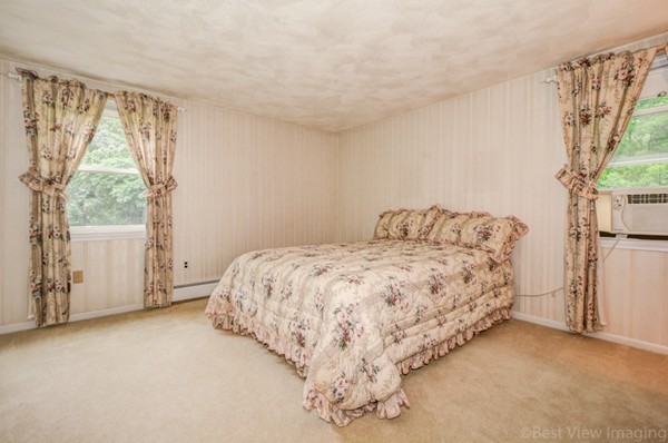 24 Fredrickson Road Billerica, MA 01821 - Photo 10 of 20 a bedroom with a bed and a window