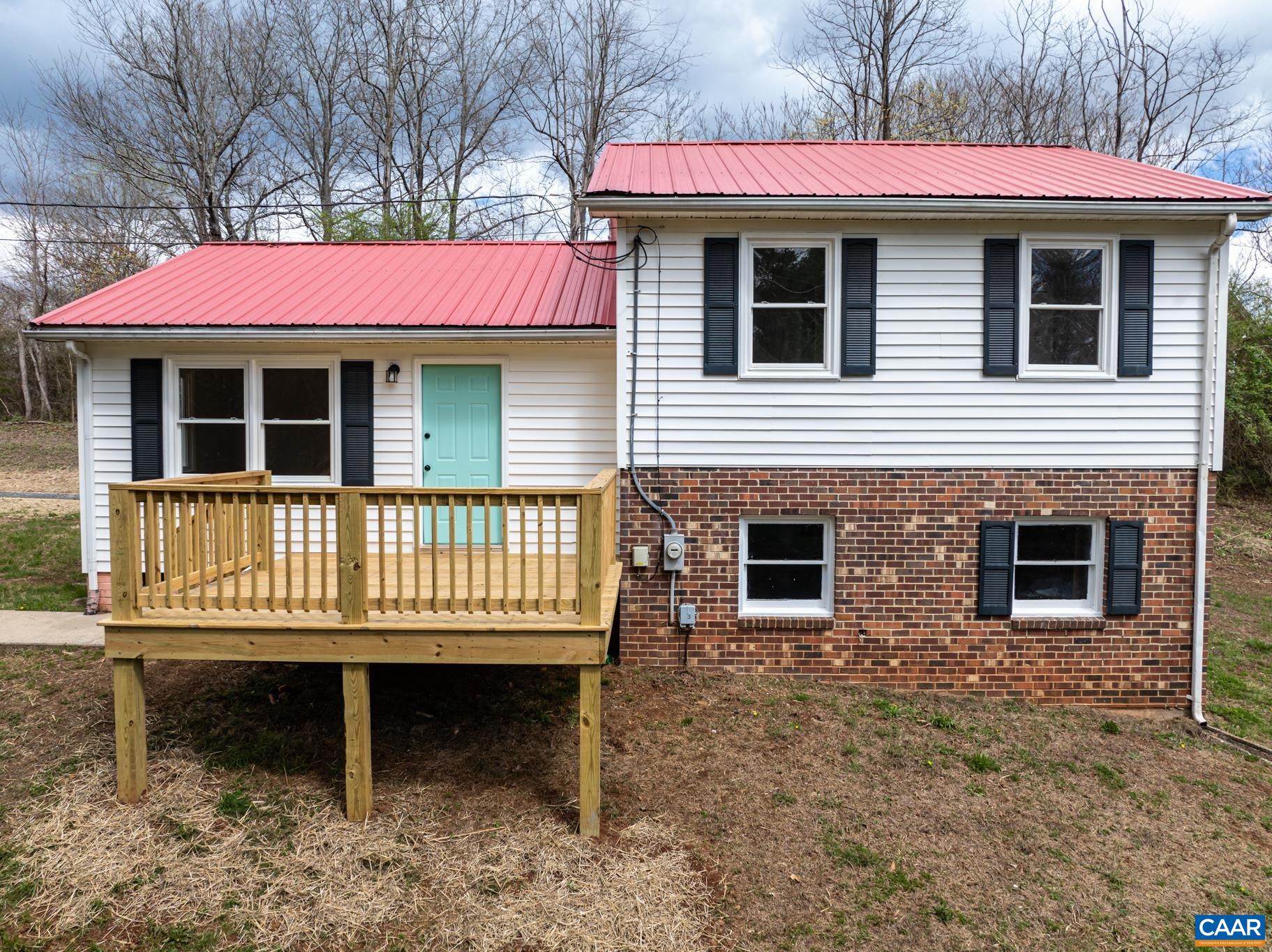7971 Irish Road Faber, VA 22938 - Photo 21 of 23 a view of a house with a small deck