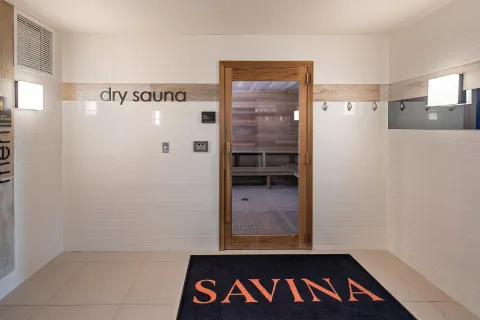 a bathroom with a bathtub and shower