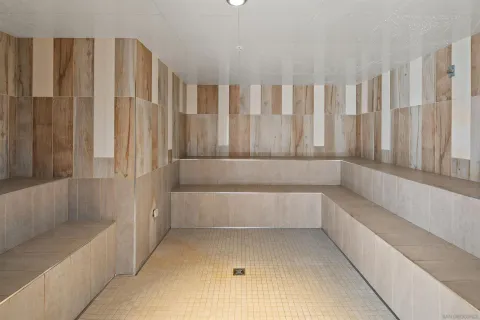 a view of tall buildings with sign board