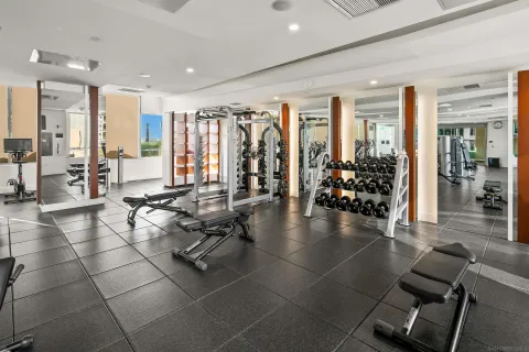 a kitchen with stainless steel appliances granite countertop sink stove and cabinets