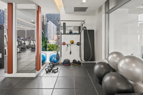 a view of a patio with table and chairs and potted plants