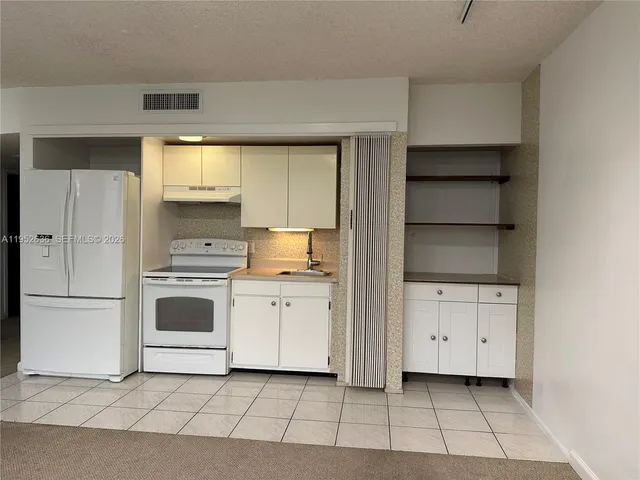 $2,100 | 900 Bay Drive, Unit 413, Miami Beach, FL 33141