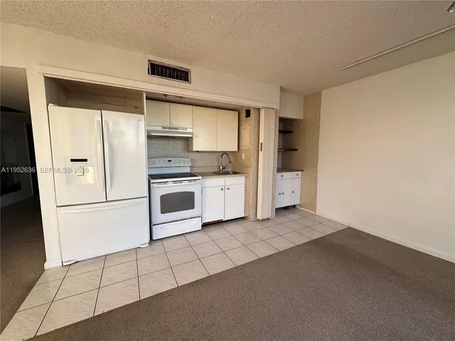 $2,100 | 900 Bay Drive, Unit 413, Miami Beach, FL 33141