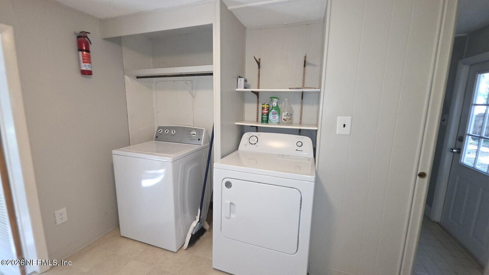 2781 Schaller Road St. Augustine, FL 32084 - Photo 9 of 9 a utility room with dryer and washer