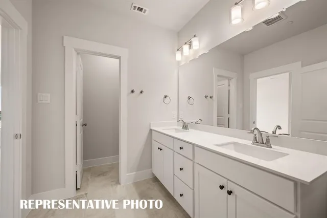 a view of staircase with white walls