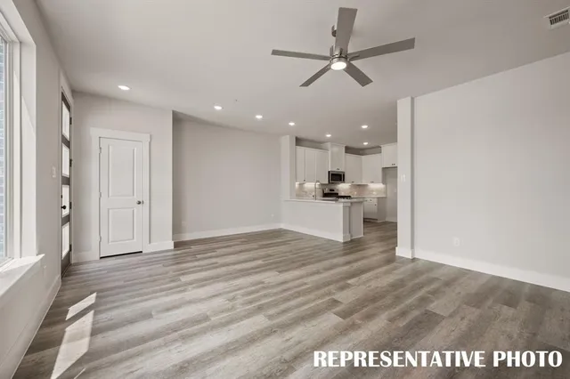 a view of swimming pool with outdoor seating and lake view