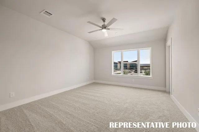 a kitchen with granite countertop a stove and a sink