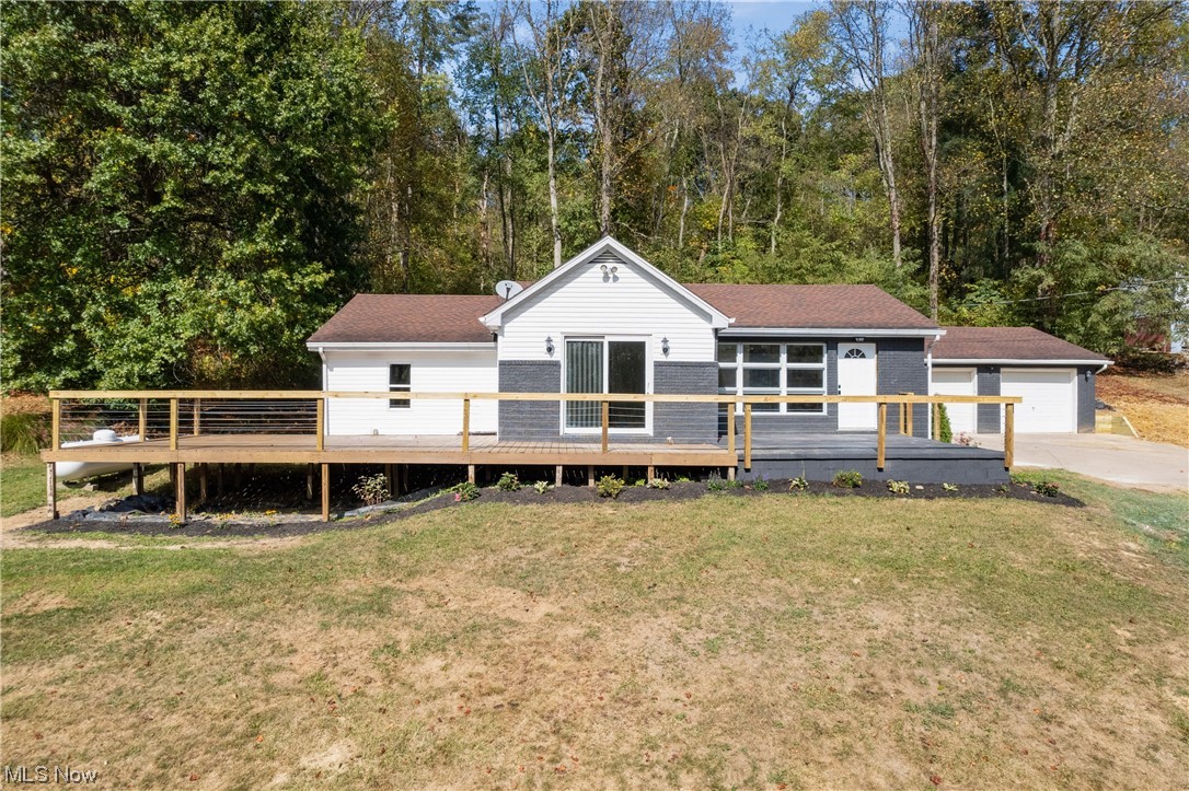 59636 Broadview Road Shadyside, OH 43947 - Photo 1 of 31 View of front of property featuring a deck and a front yard