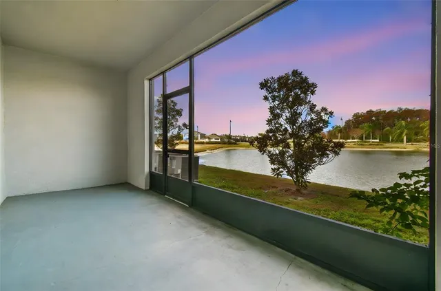 an aerial view of a house with outdoor space