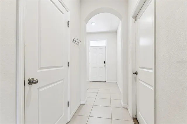 a kitchen with stainless steel appliances granite countertop a stove top oven a sink and dishwasher