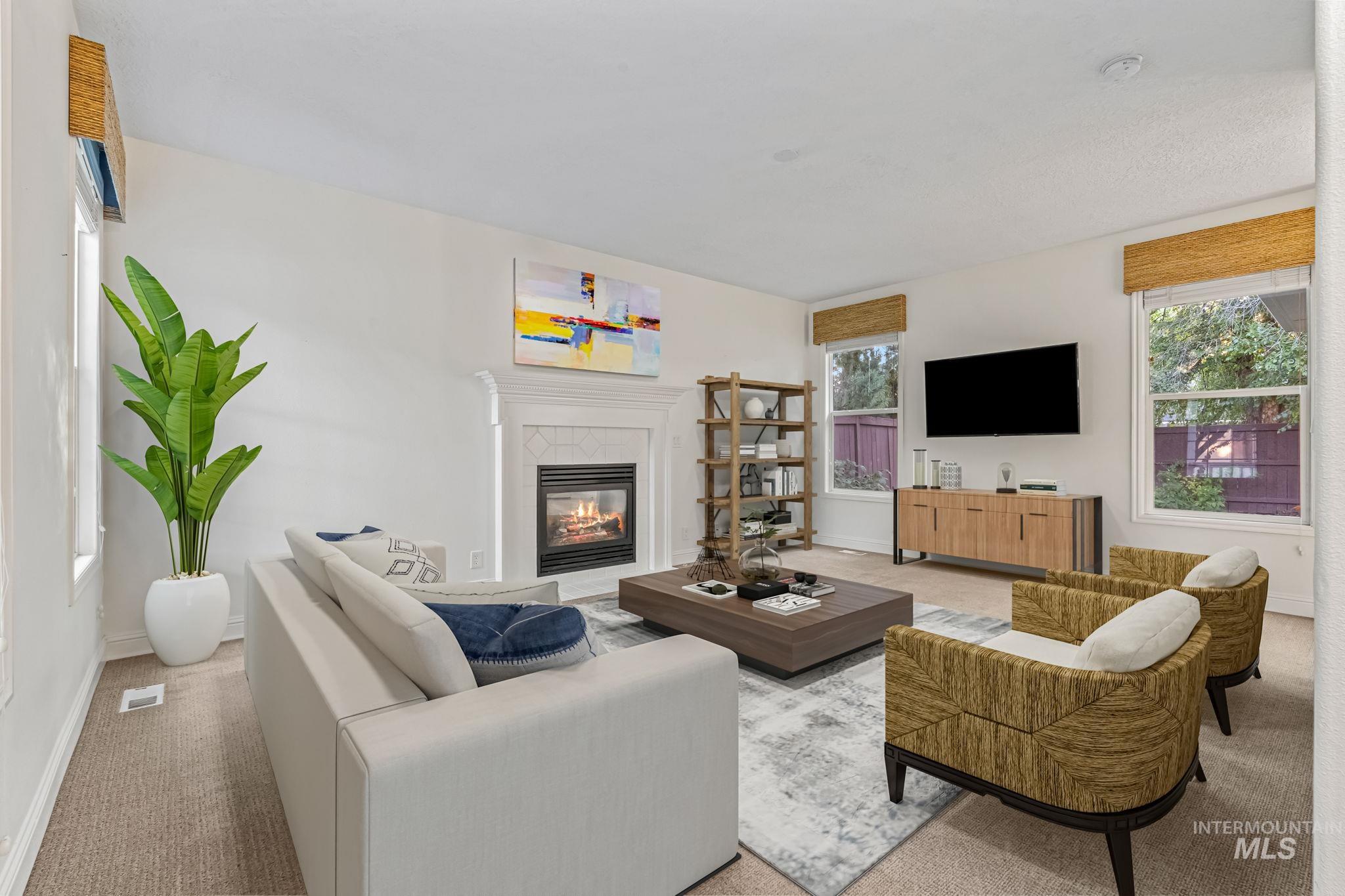 6099 North Heathrow Way Boise, ID 83713 - Photo 9 of 39 Living room featuring digital staging