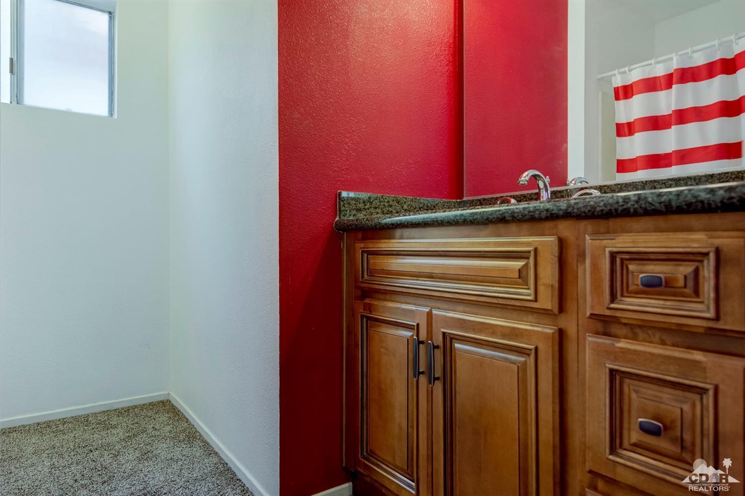 73769 Haystack Road Palm Desert, CA 92260 - Photo 27 of 34 a view of a fireplace
