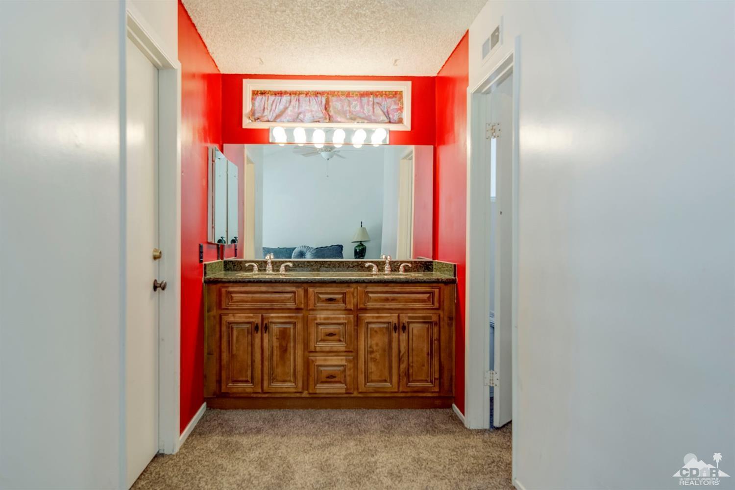 73769 Haystack Road Palm Desert, CA 92260 - Photo 33 of 34 a bathroom with a sink and a mirror