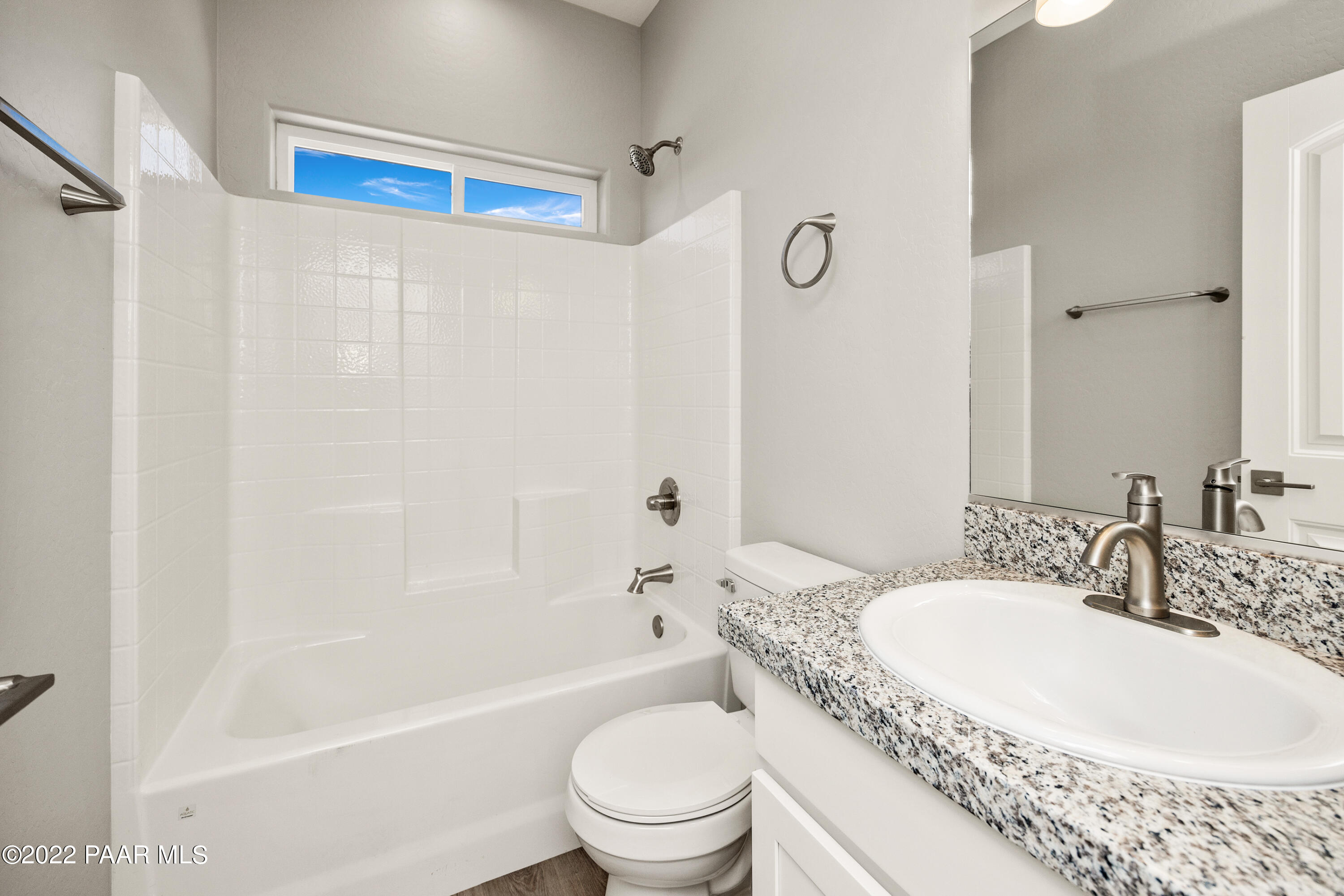 4726 East Amber Road Prescott, AZ 86301 - Photo 12 of 24 a bathroom with a sink a toilet and a bathtub