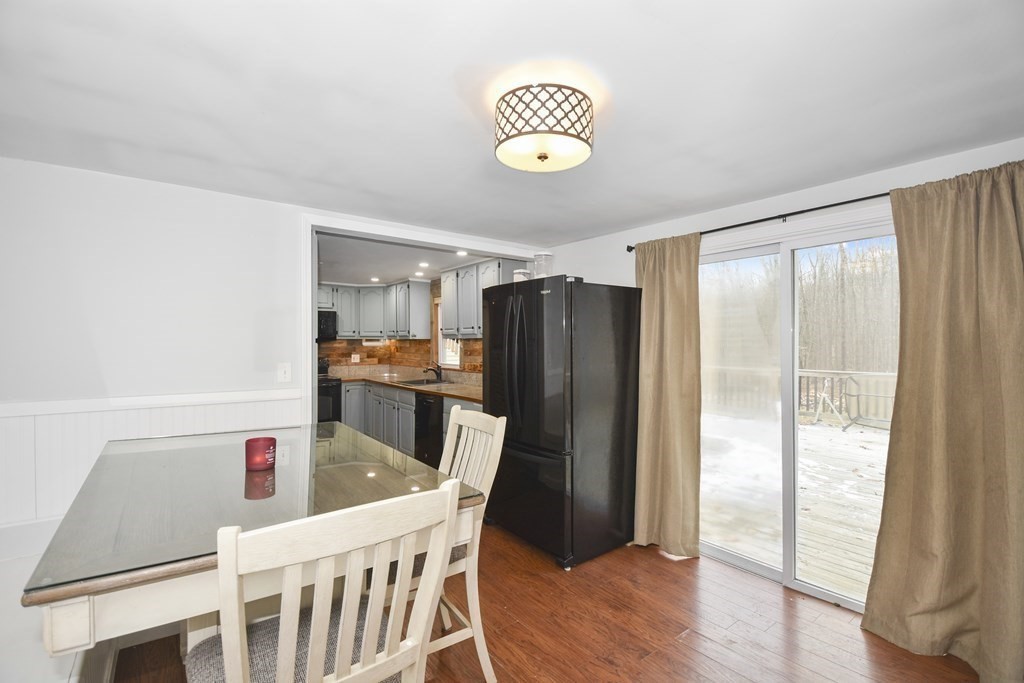 22 Carleton Road Leicester, MA 01542 - Photo 11 of 28 a view of a dining room with furniture window and wooden floor