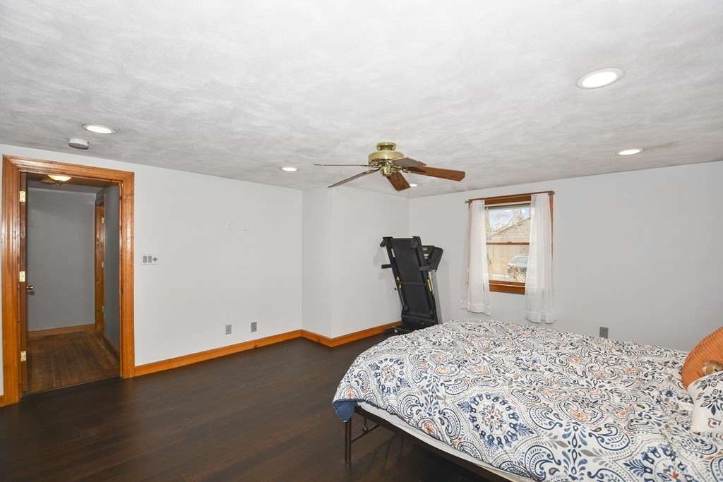 22 Carleton Road Leicester, MA 01542 - Photo 14 of 28 a bedroom with a bed and a window