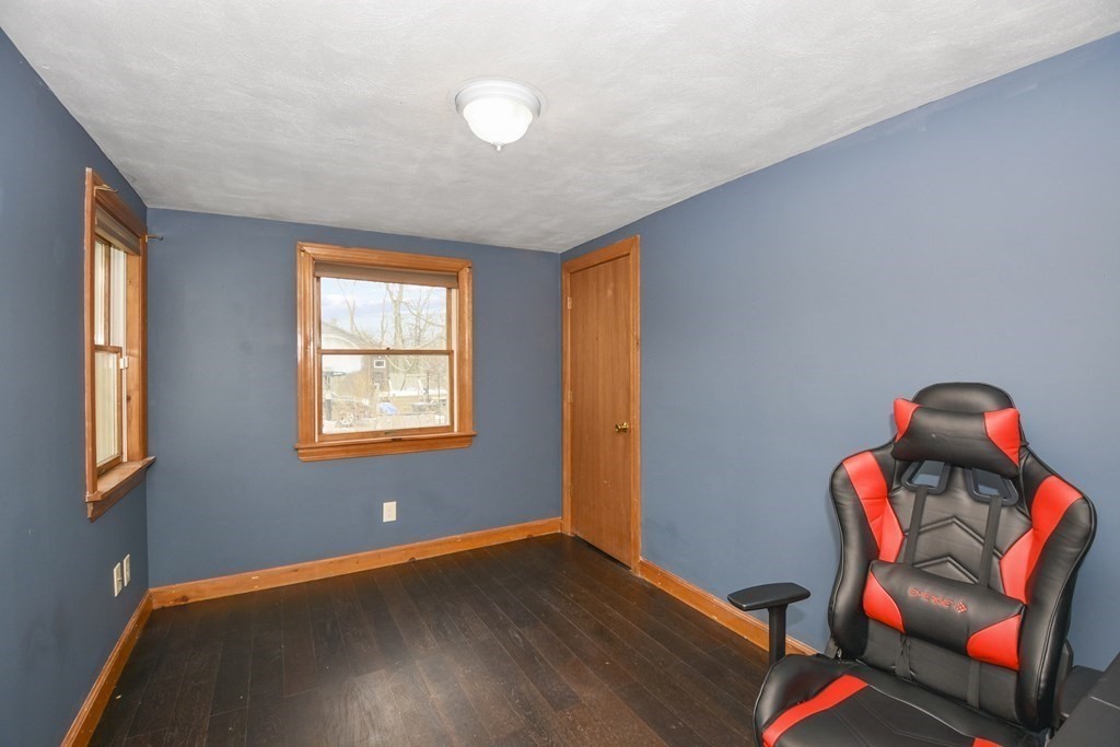 22 Carleton Road Leicester, MA 01542 - Photo 18 of 28 a room with furniture and a window