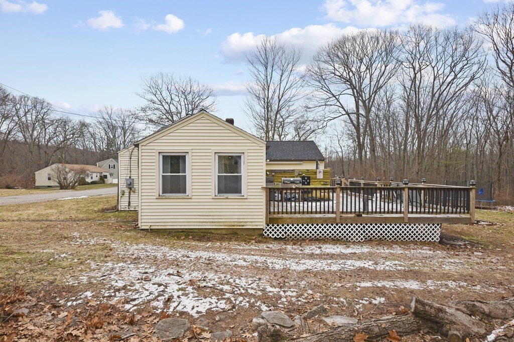 22 Carleton Road Leicester, MA 01542 - Photo 21 of 28 a front view of a house with a garden