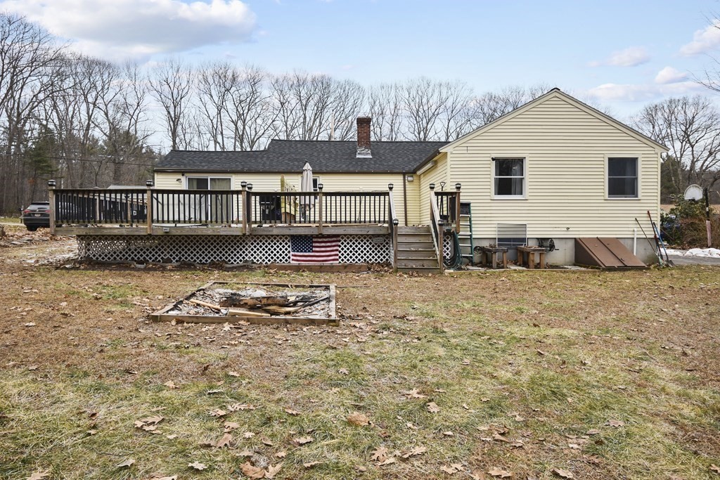 22 Carleton Road Leicester, MA 01542 - Photo 23 of 28 a view of a house with backyard and sitting area