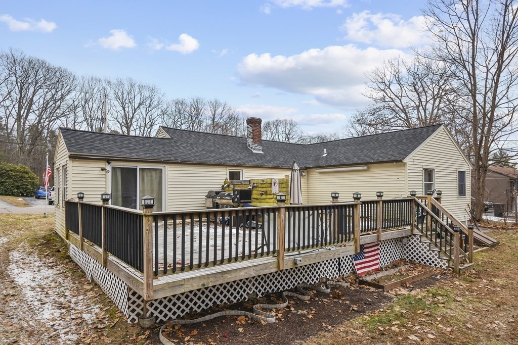 22 Carleton Road Leicester, MA 01542 - Photo 24 of 28 a view of a house with wooden deck
