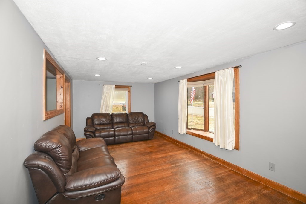 22 Carleton Road Leicester, MA 01542 - Photo 4 of 28 a living room with furniture and a window