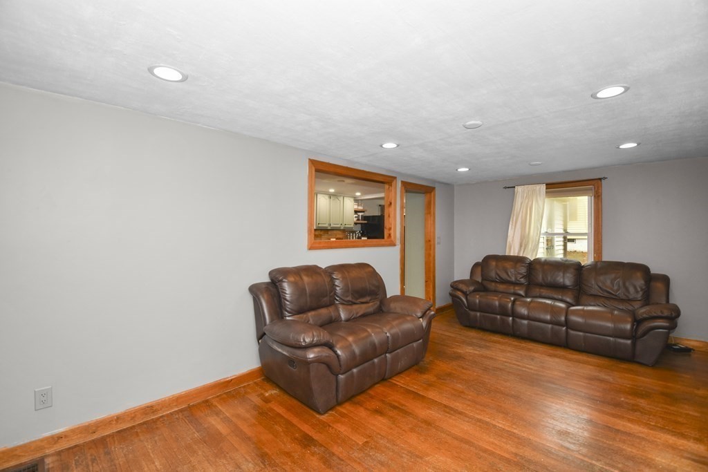22 Carleton Road Leicester, MA 01542 - Photo 5 of 28 a living room with furniture window and couch