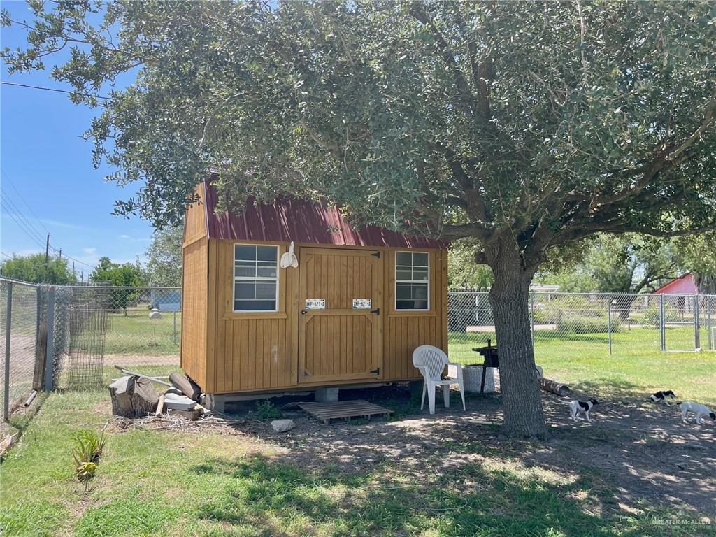 3107 North Hutto Road Donna, TX 78537 - Photo 11 of 11 a backyard of a house with outdoor seating