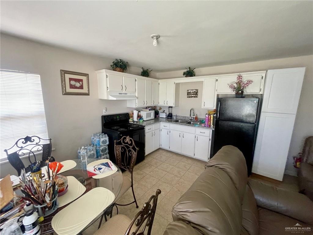 3107 North Hutto Road Donna, TX 78537 - Photo 5 of 11 a bedroom with furniture and a bed