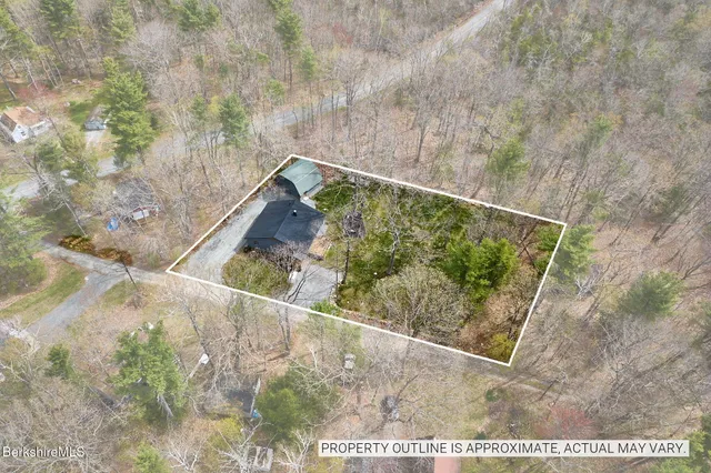 a view of a yard from a balcony