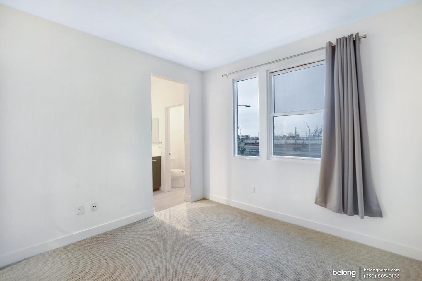 1351 Pullman Way Oakland, CA 94607 - Photo 11 of 24 a view of an empty room with a window