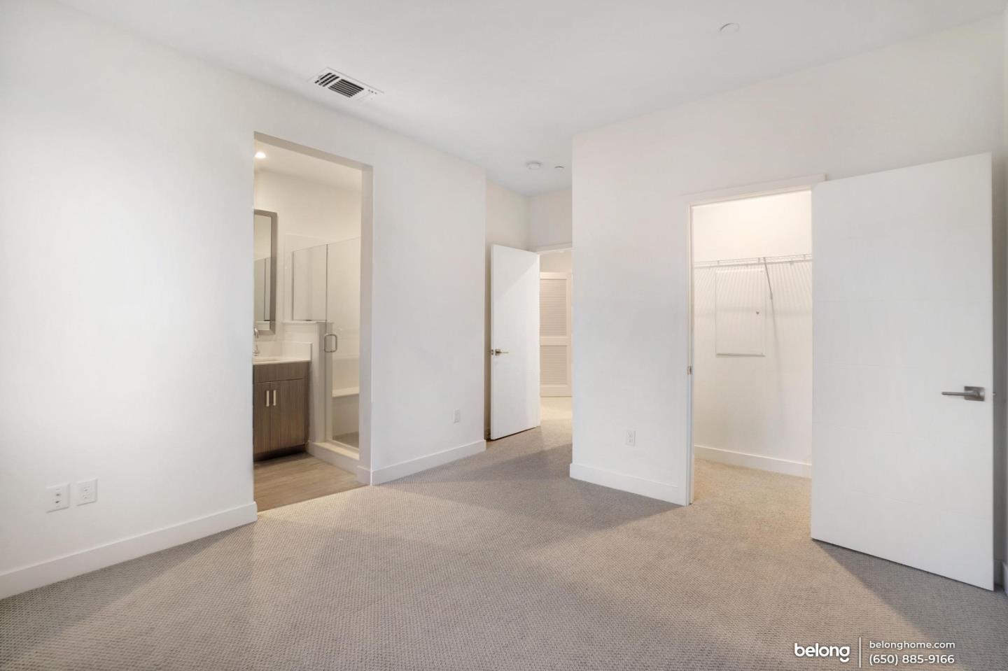 1351 Pullman Way Oakland, CA 94607 - Photo 12 of 24 a view of a big room with closet and mirror