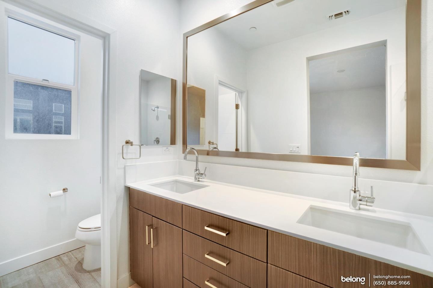 1351 Pullman Way Oakland, CA 94607 - Photo 23 of 24 a bathroom with a sink and a toilet