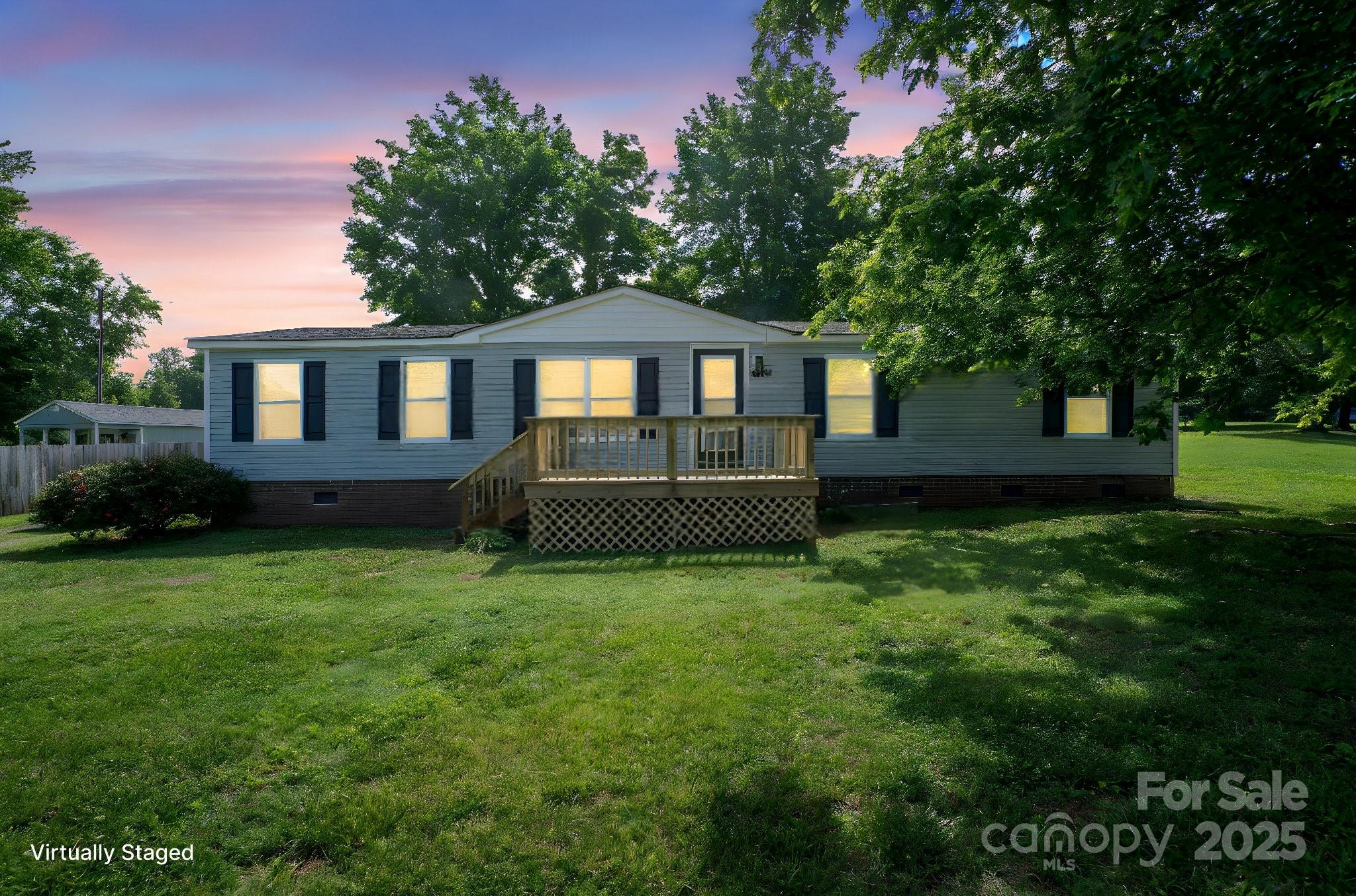 6085 Faith Road Salisbury, NC 28146 - Photo 28 of 29 a front view of a house with a garden