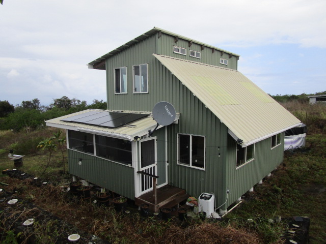 89-902 Rd Road Captain Cook, HI 96704 - Photo 5 of 30 a aerial view of a house with a yard and balcony