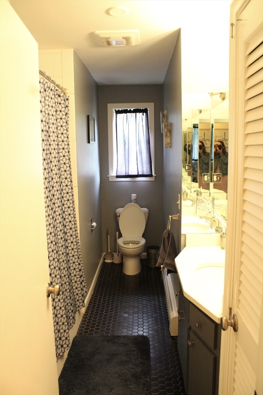 225 Braemoor Road Brockton, MA 02301 - Photo 13 of 29 a bathroom with a sink toilet and shower