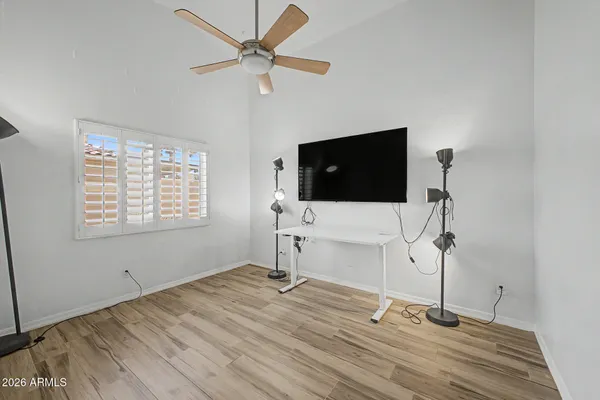 a view of a livingroom with a flat screen tv