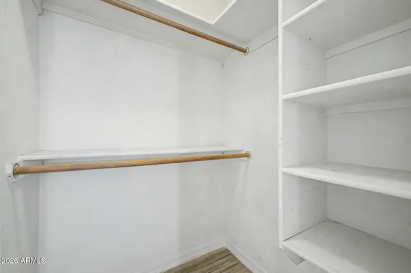 a view of small space with racks on the wall