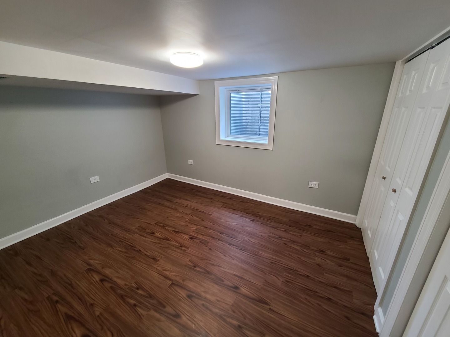 11032 Major Avenue Chicago Ridge, IL 60415 - Photo 8 of 10 wooden floor in an empty room with a window