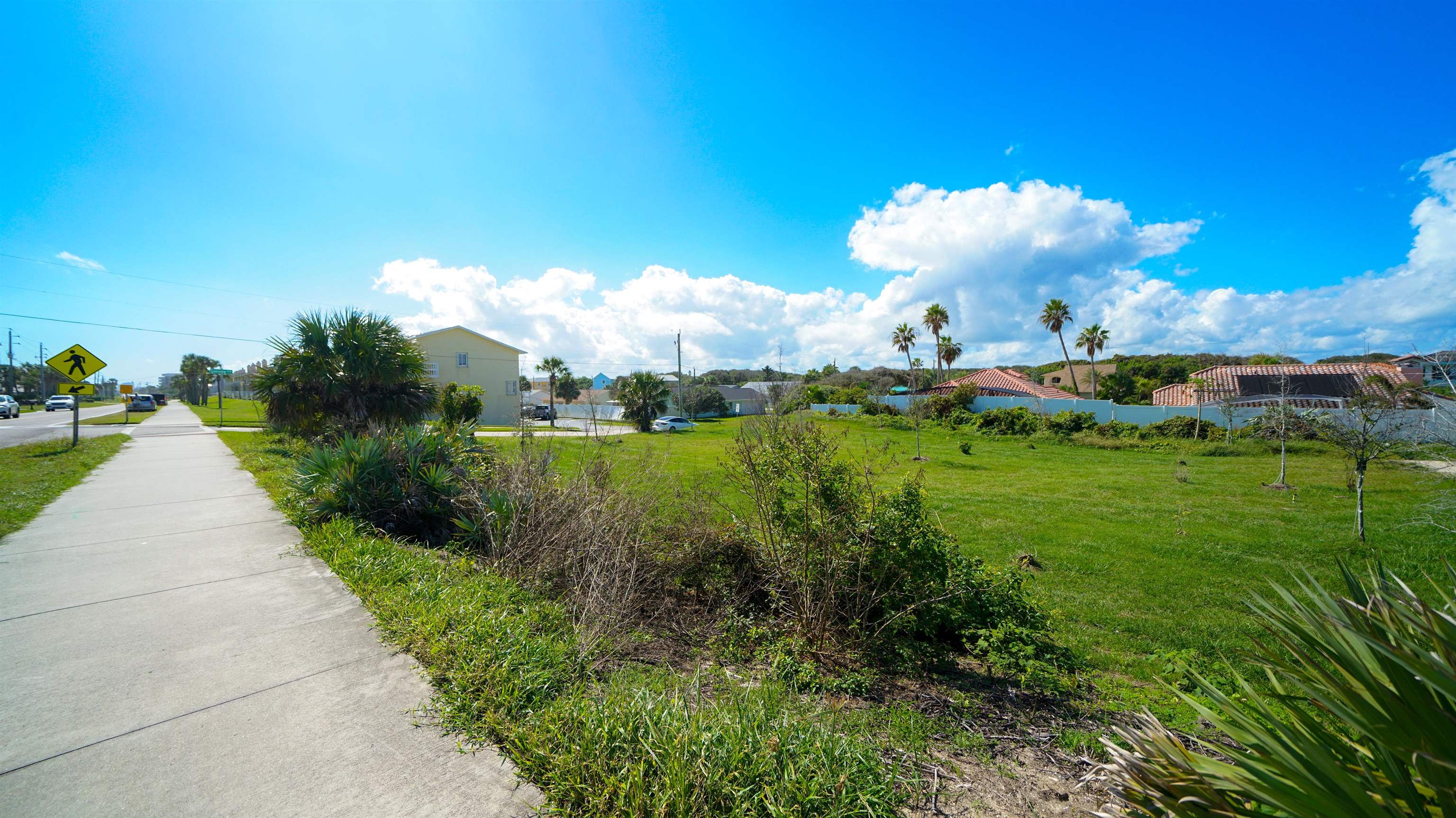 4736 South Atlantic Avenue Ponce Inlet, FL 32127 - Photo 21 of 32 a view of a lake with a big yard