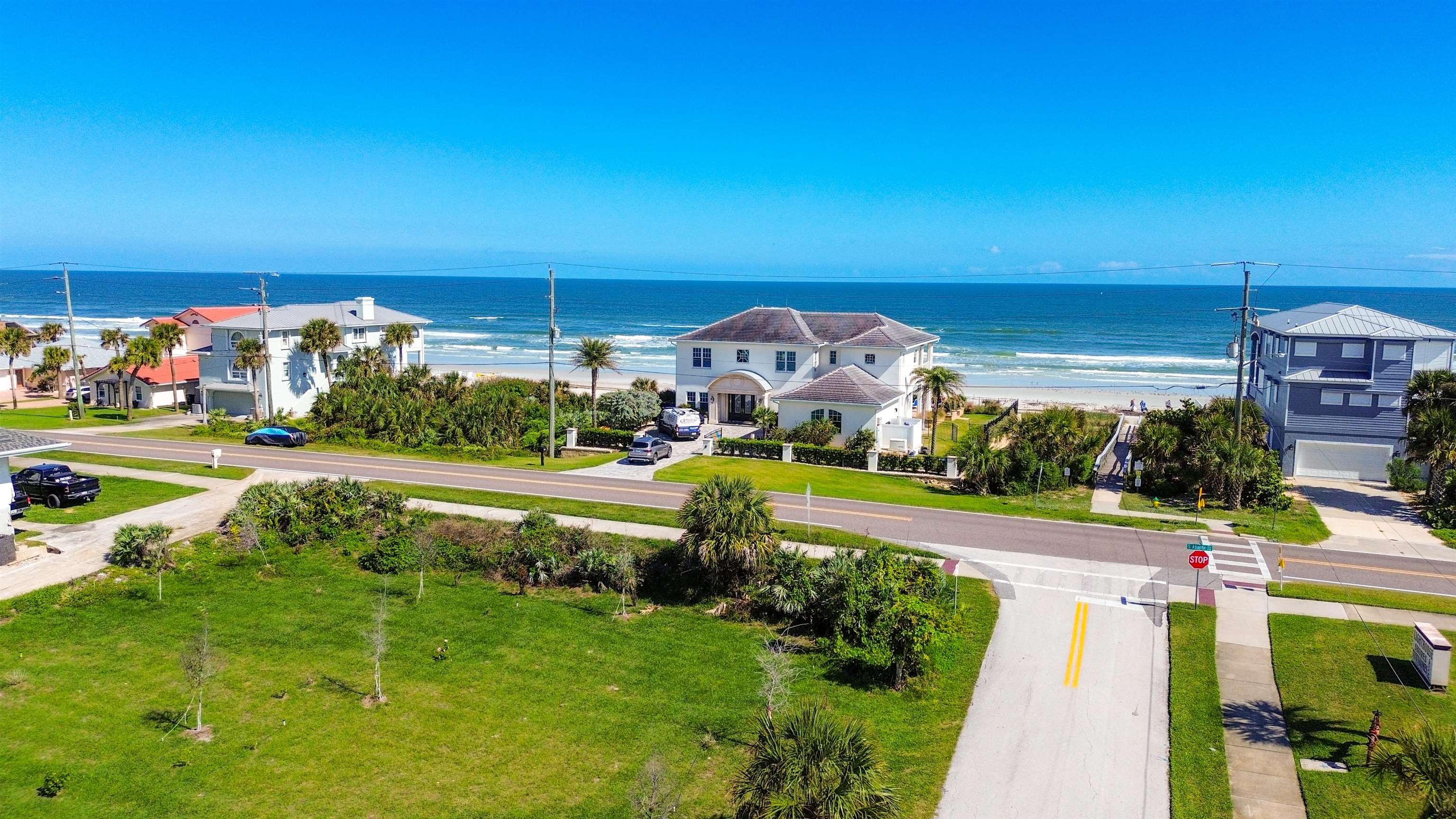 4736 South Atlantic Avenue Ponce Inlet, FL 32127 - Photo 26 of 32 a view of a house with a yard