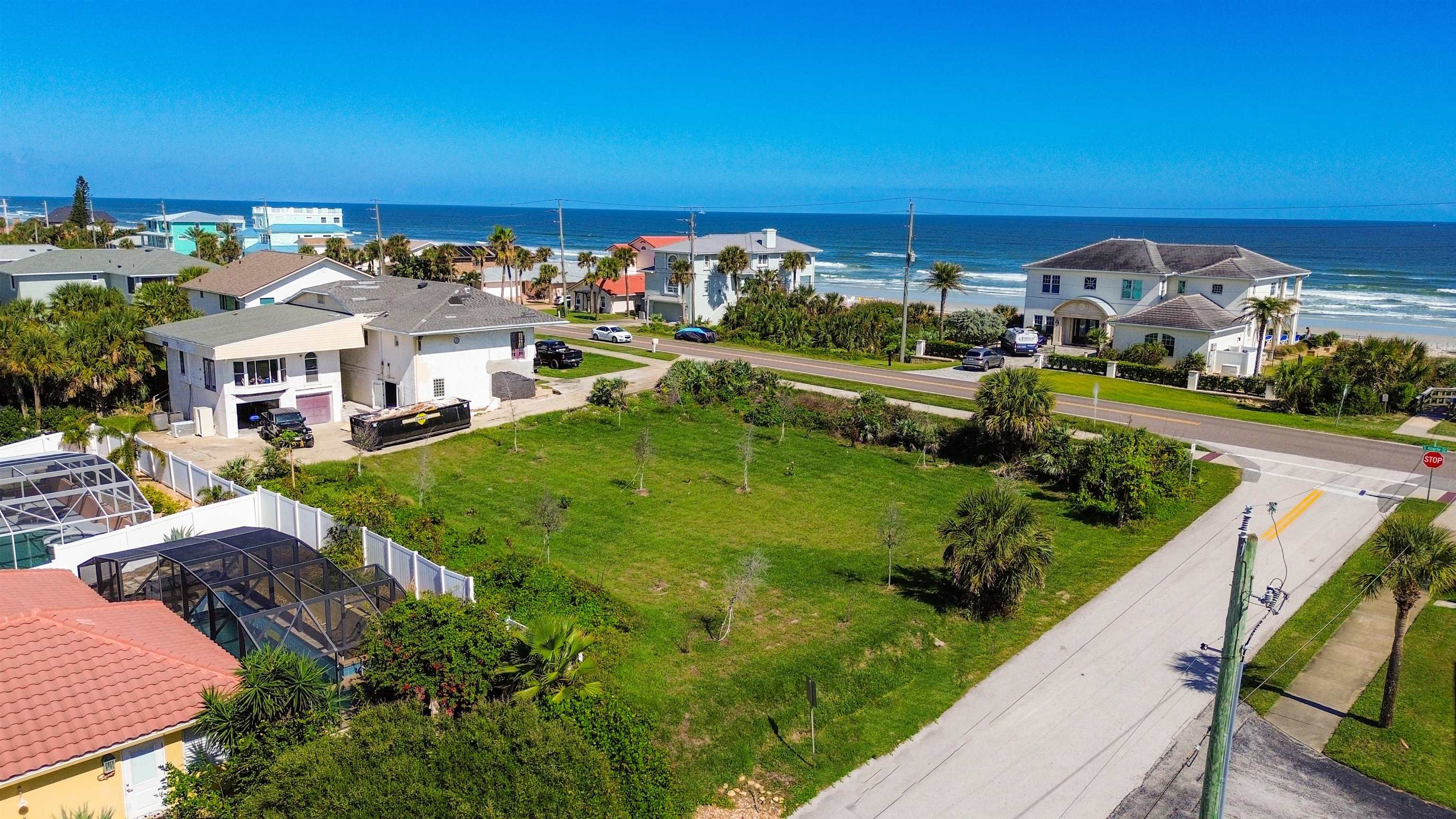 4736 South Atlantic Avenue Ponce Inlet, FL 32127 - Photo 9 of 32 a view of a city with lawn chairs