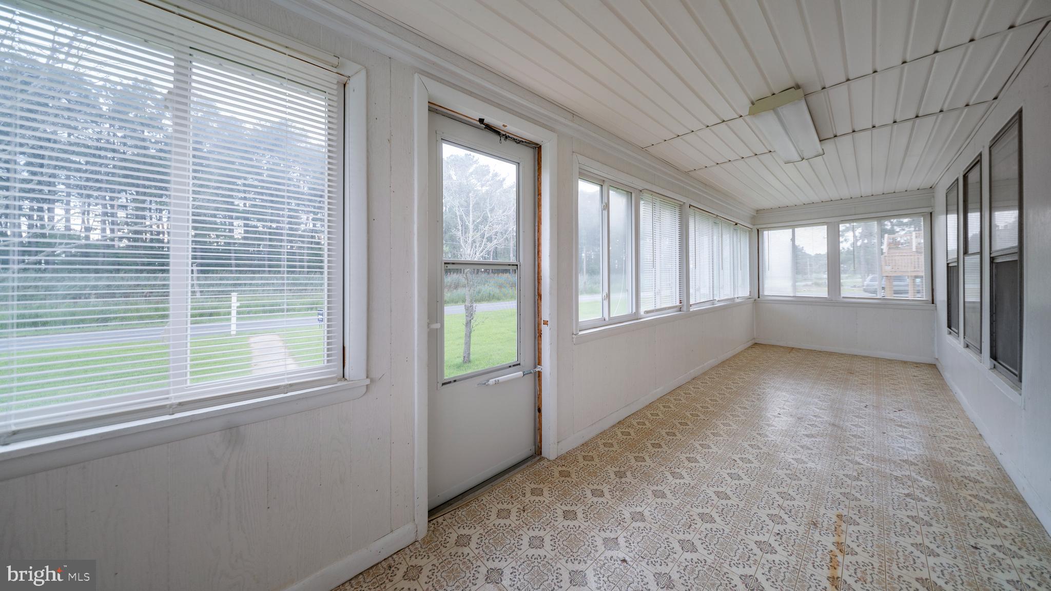 2539 Old House Point Road Fishing Creek, MD 21634 - Photo 17 of 33 a view of an empty room with a window