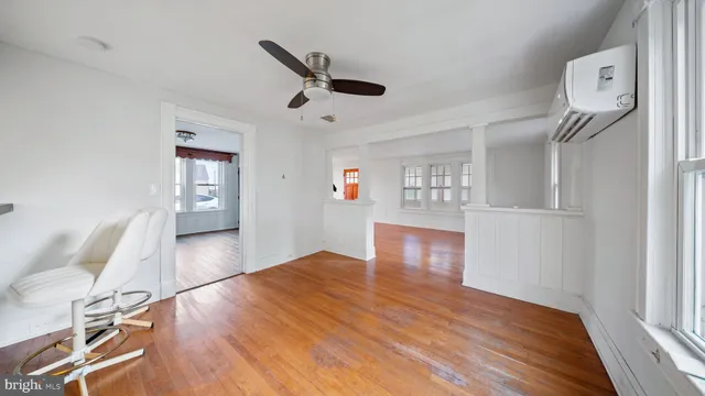 a view of a livingroom with wooden floor