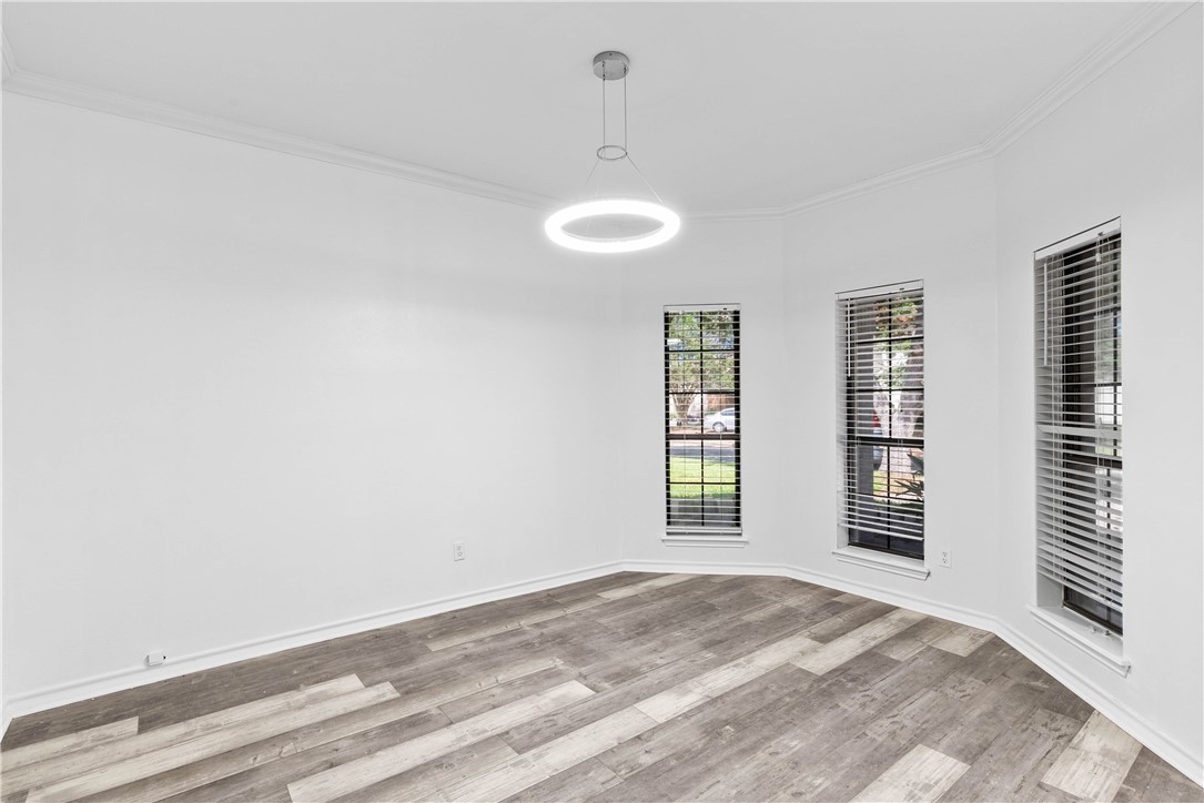 7009 Bevington Drive Corpus Christi, TX 78413 - Photo 5 of 34 a view of an empty room with a window
