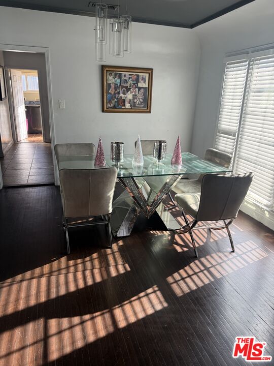 1218 North Spring Avenue Compton, CA 90221 - Photo 12 of 16 a view of a dining room with furniture window and wooden floor