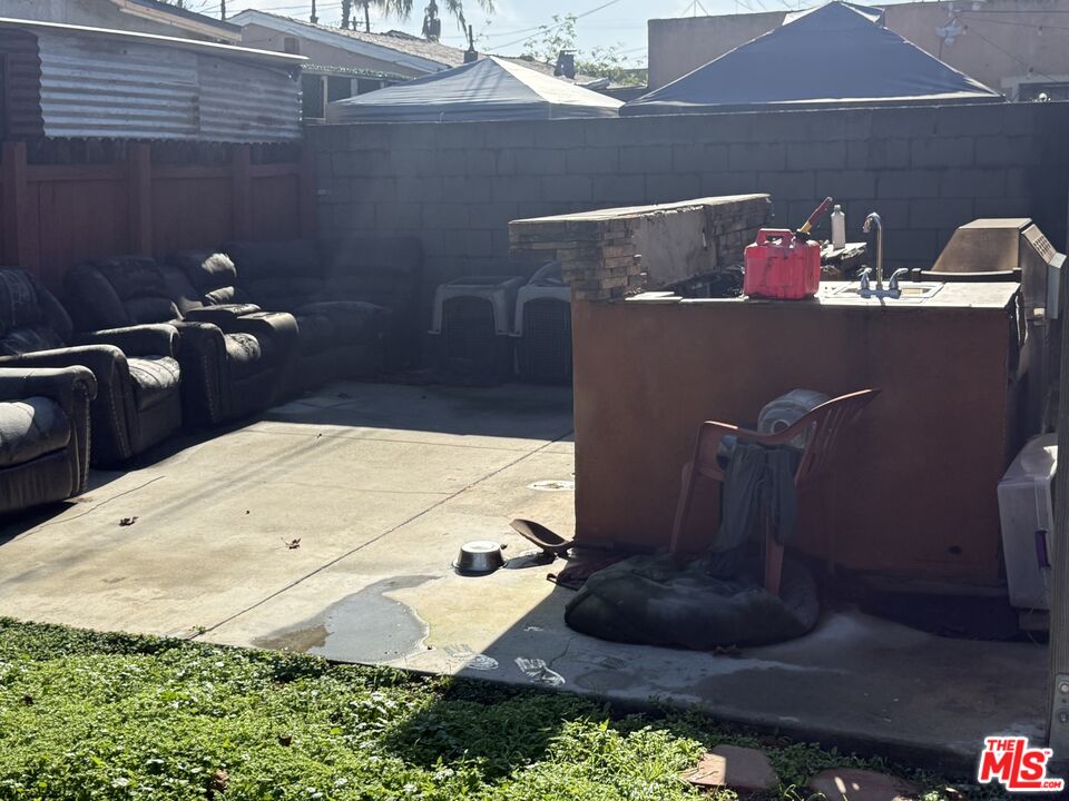 1218 North Spring Avenue Compton, CA 90221 - Photo 16 of 16 a bathroom with a sink