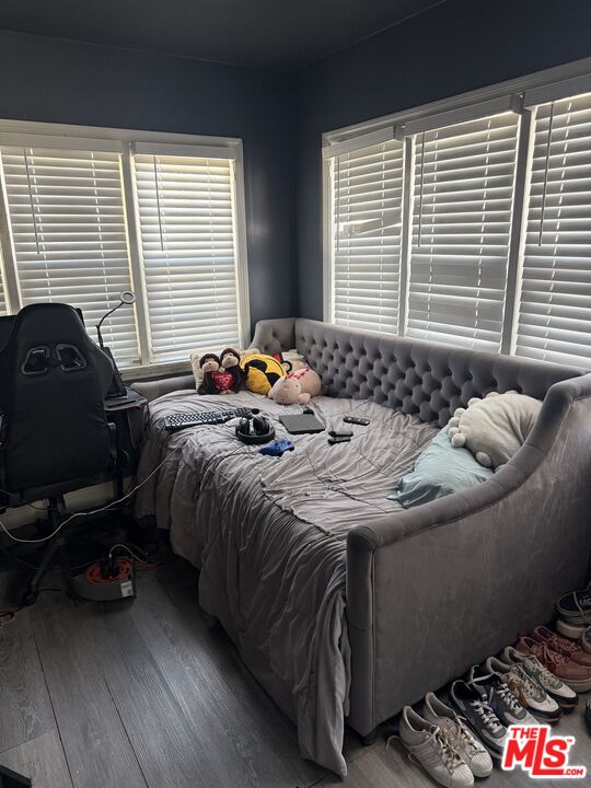 1218 North Spring Avenue Compton, CA 90221 - Photo 5 of 16 a bedroom with bed and a window